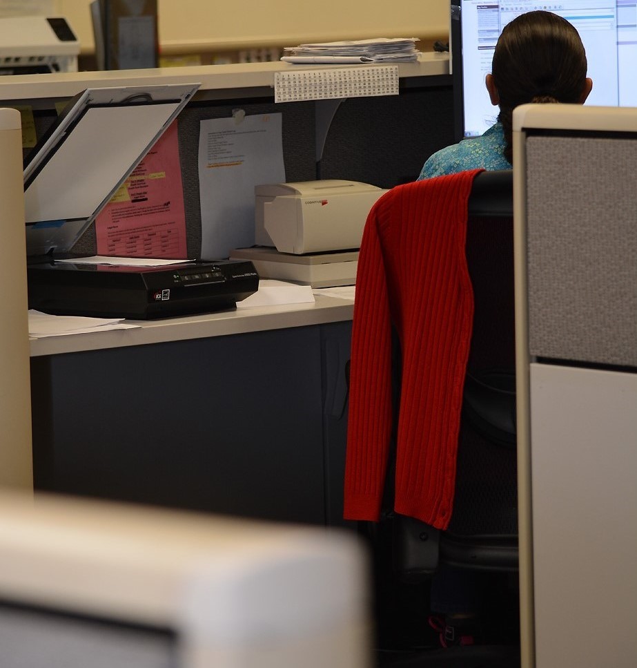 Photo of clerk at desk